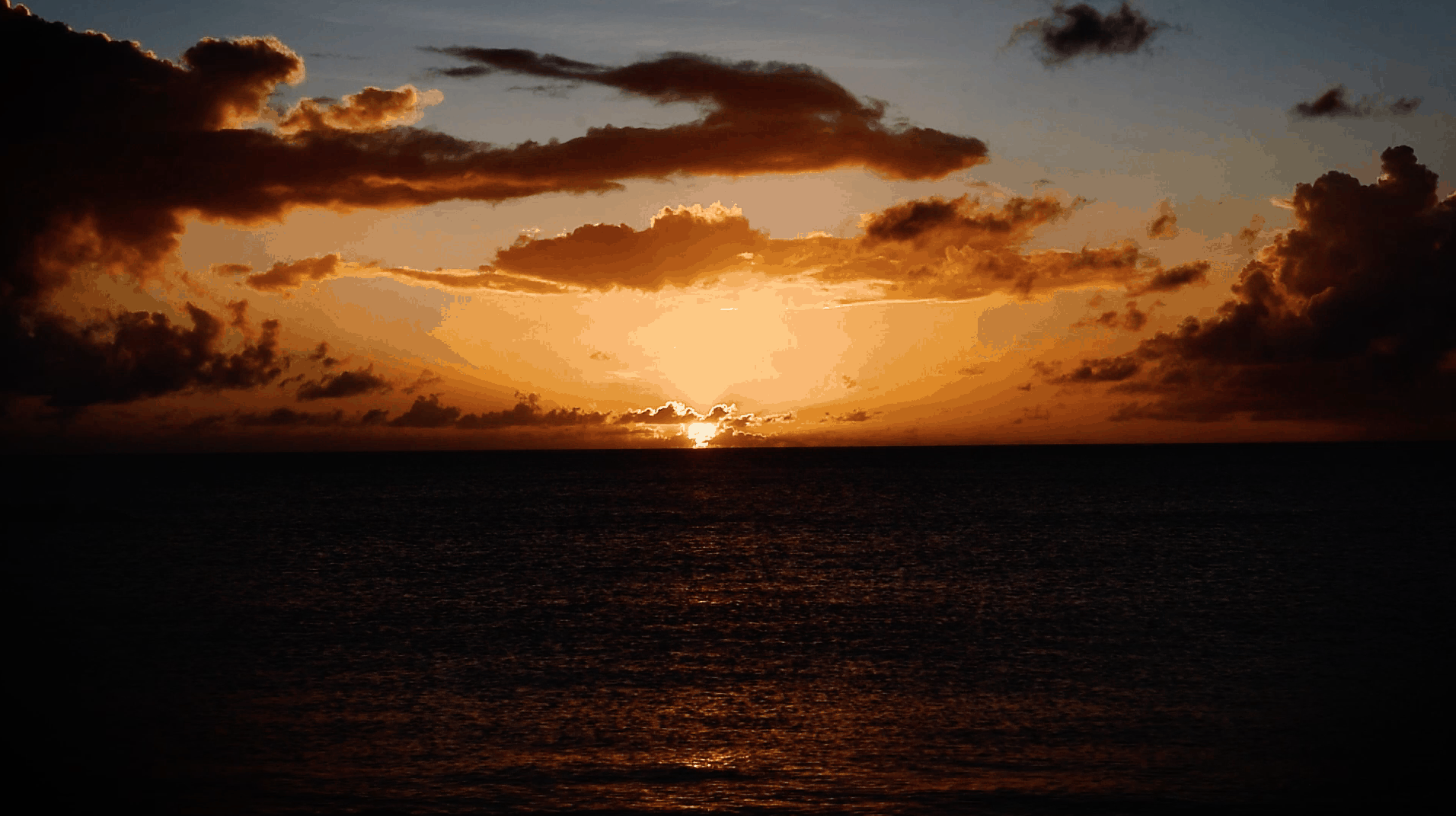 Sunset Four Seasons Nevis by Patrick Bennett
